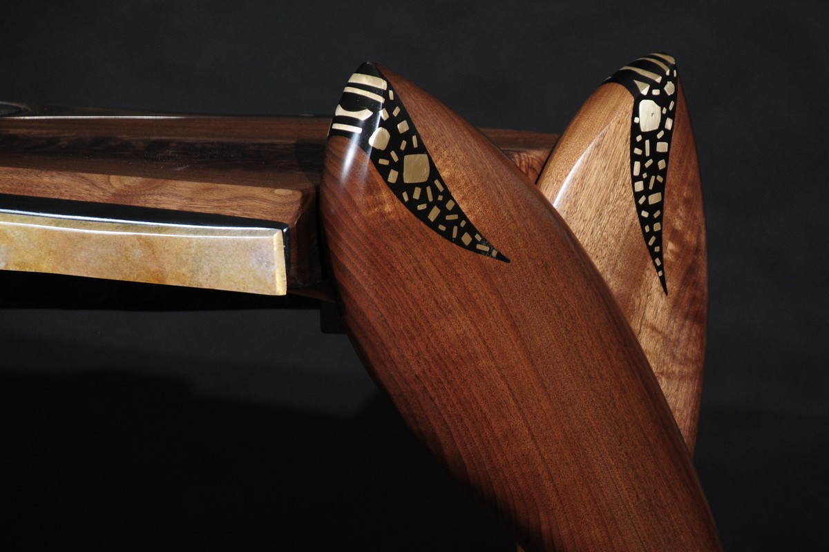 Detail of the bronze inlay and top